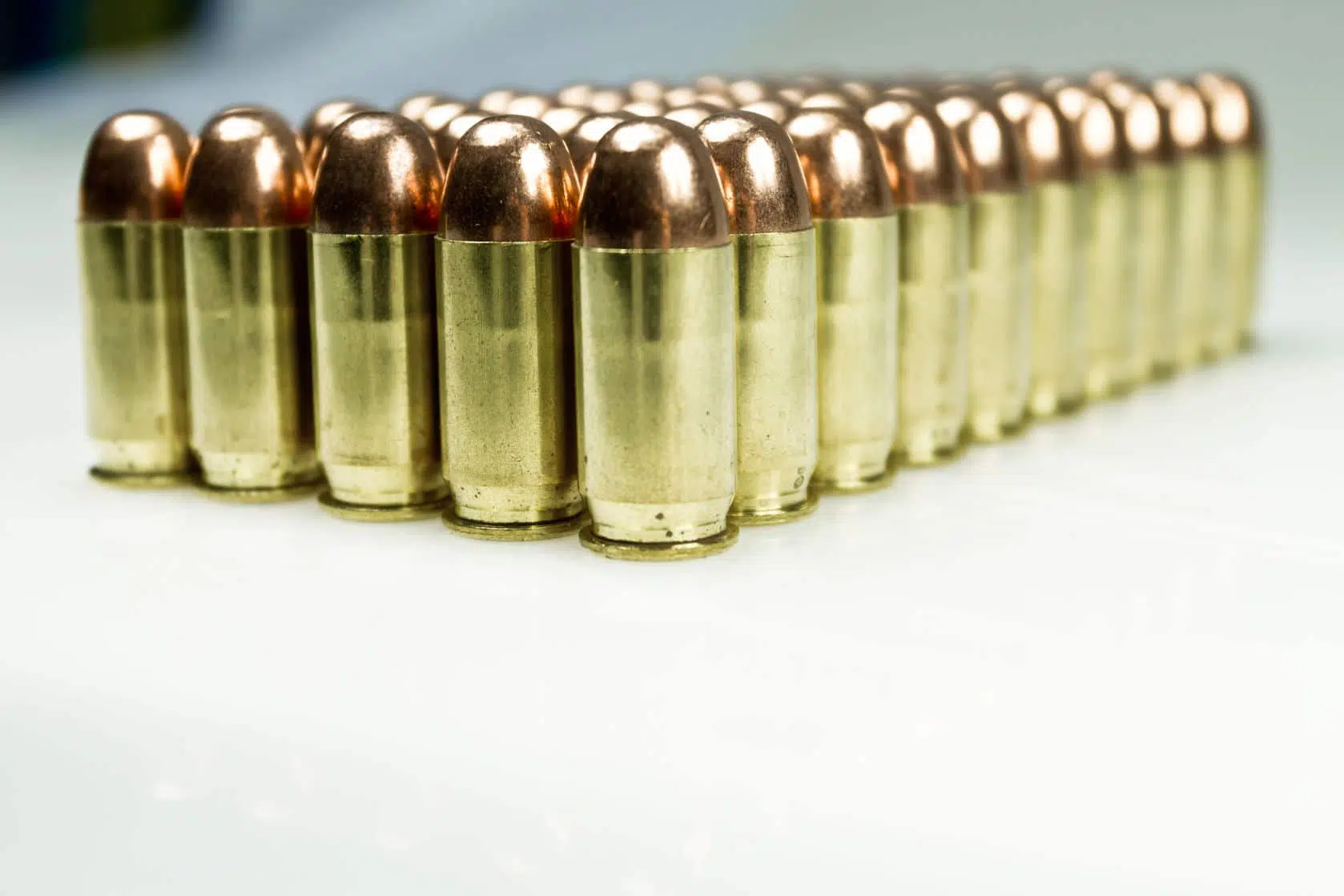 Image of a collection of bullets. Possession of high-capacity magazines may be permitted now that a federal judge has sided with the NRA on California's new gun laws.